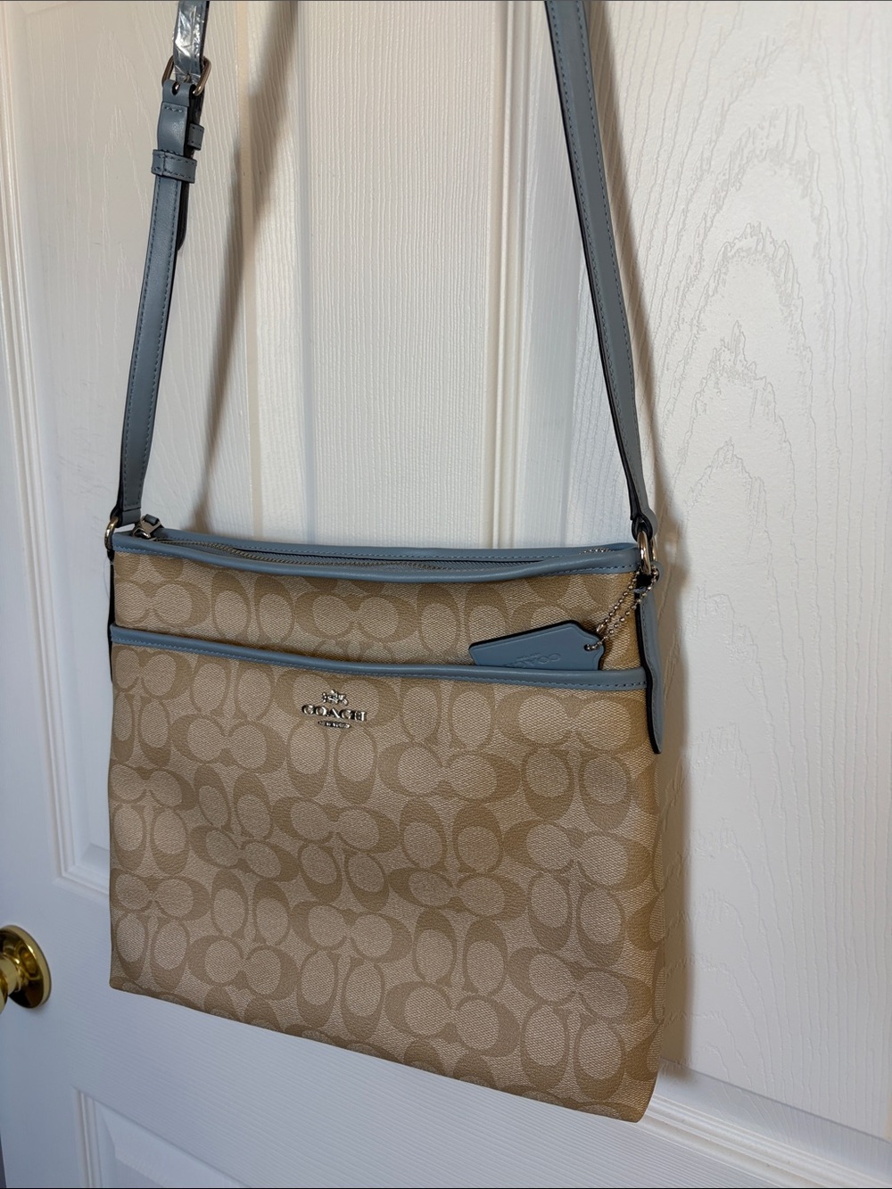 Coach like new Khaki Signature Crossbody with Sky Blue Trim